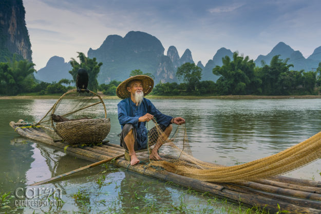 CarynEsplin-WhiteBeardSettingtheNet-CormorantSunsetFishermen-Guilin-China-karst-Guangxi Zhuang region